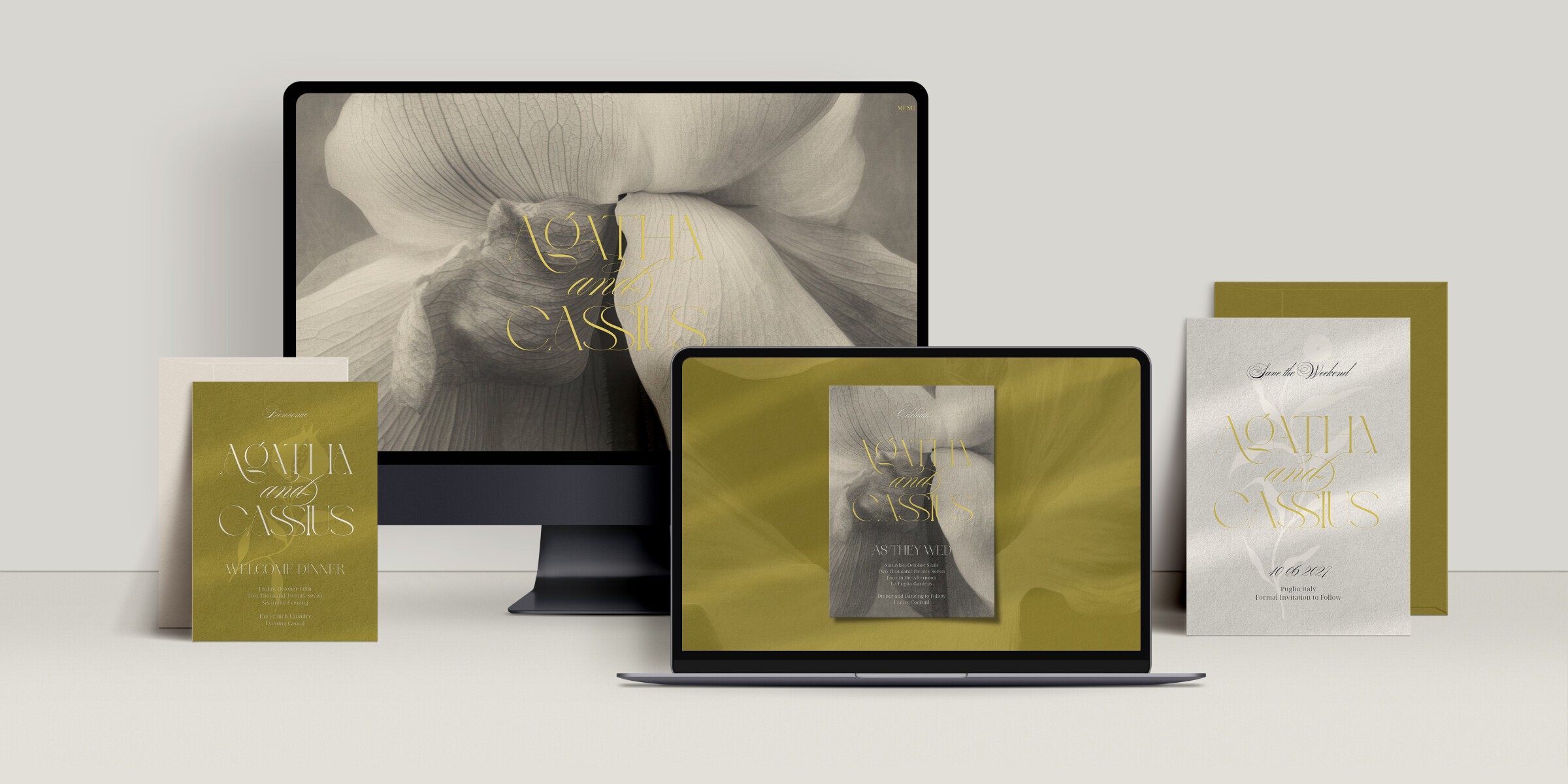A luxury wedding stationery suite displayed across print and digital formats. The design features a soft monochromatic floral photograph paired with elegant gold typography spelling the couple's names. Shown are a save-the-date card, welcome dinner invitation, formal invitation with olive-green envelope, and matching wedding website displayed on desktop and laptop screens. The overall aesthetic is refined and romantic, blending botanical imagery, muted neutrals, and metallic accents.